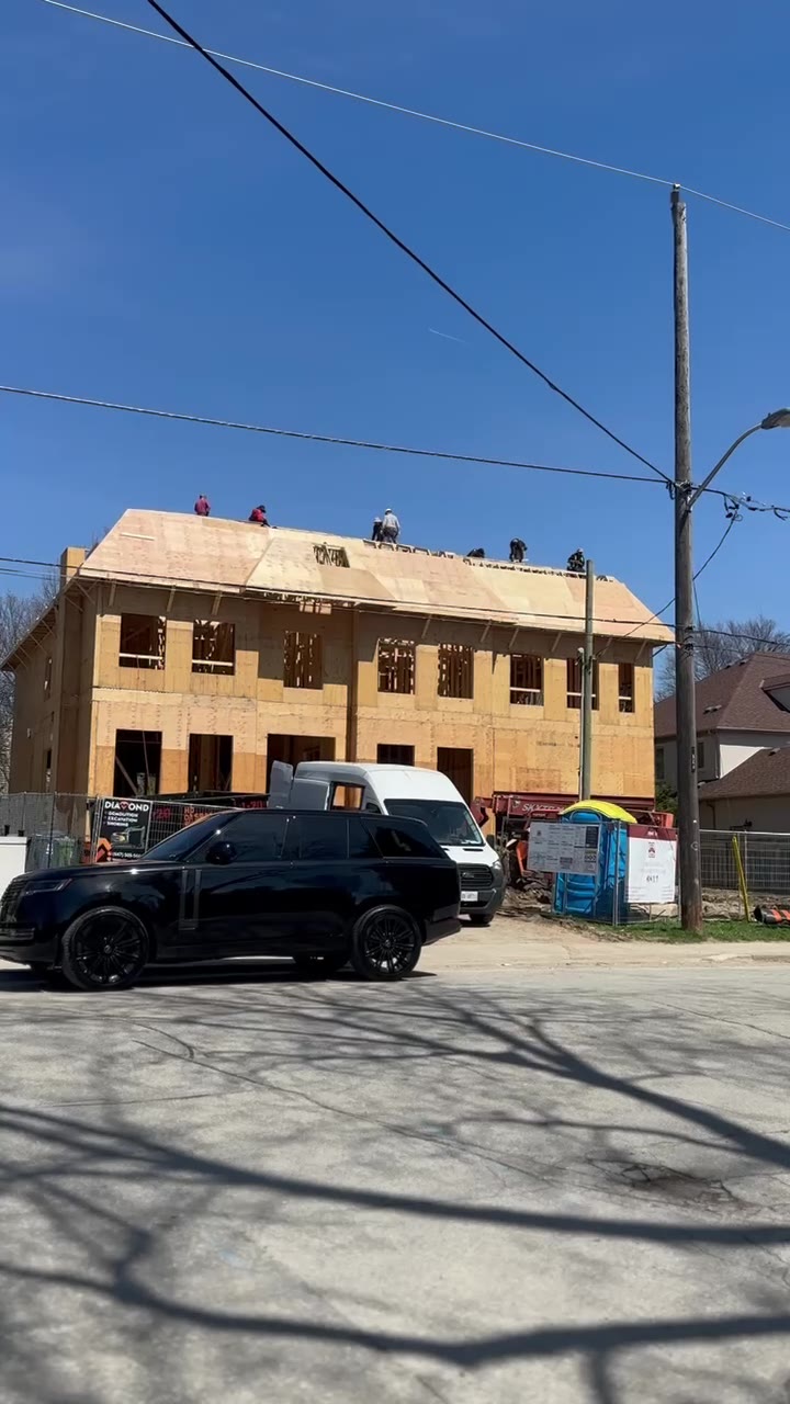 Roof framing crew at work